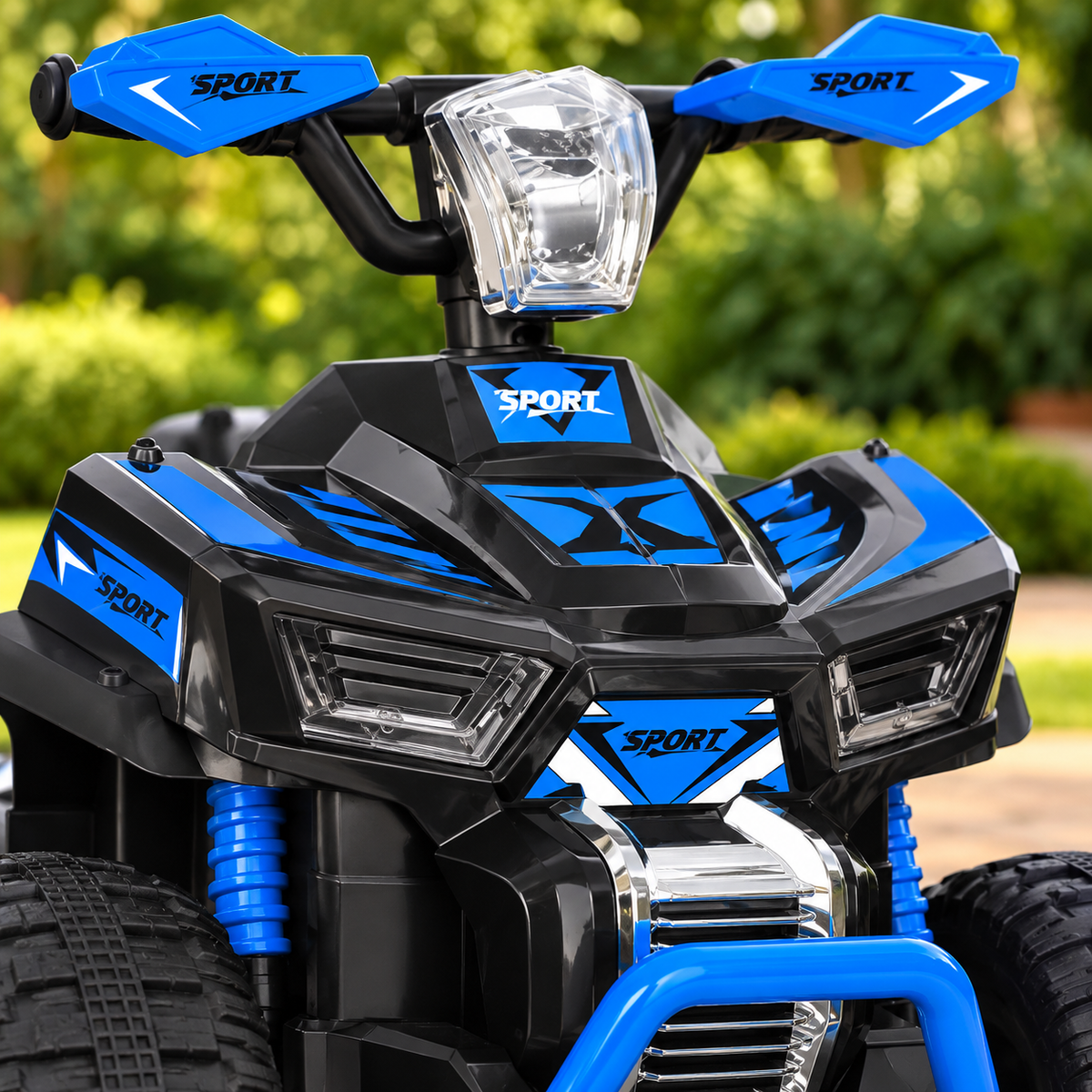 Detalle del manubrio y frontal de la cuatrimoto infantil azul